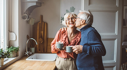 Man kissing partner on the cheek